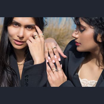 Gold Ring with Black and White Diamonds in Hourglass Shape
