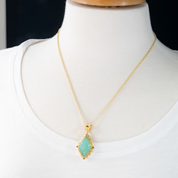 Classic Collection Pendant in 22kt & 18kt gold set with Peruvian
Opal, Black and White Diamonds
