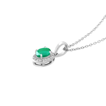 1.50 Carat Genuine Emerald and White Zircon Halo Pendant in Sterling
Silver - 18"<br />