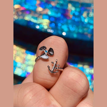 Sterling Silver Propeller-Anchor Ring with Rope Design and Blue CZ Accent.