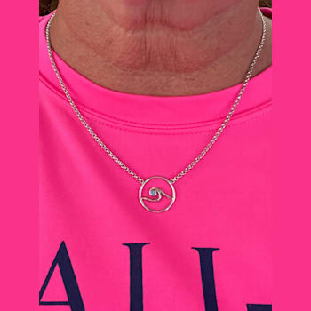 Sterling Silver Wave Circle Necklace with Rolo Chain and Blue CZ Accent.