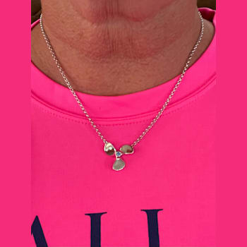 Sterling Silver Propeller Rolo Chain Necklace with Blue CZ Accent.