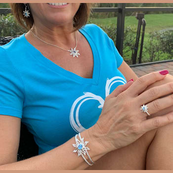 Sterling Silver Sun Cuff Bracelet with Blue CZ Center.