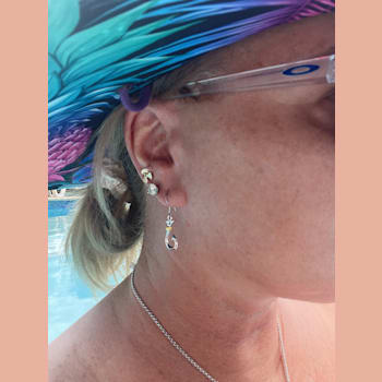 Sterling Silver Fishing Hook Dangle Style Earrings with Blue CZ Accents,
Medium Hook Size.
