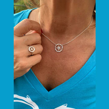 Sterling Silver Compass Rolo Chain Necklace with Crystal and Blue CZ Accents.