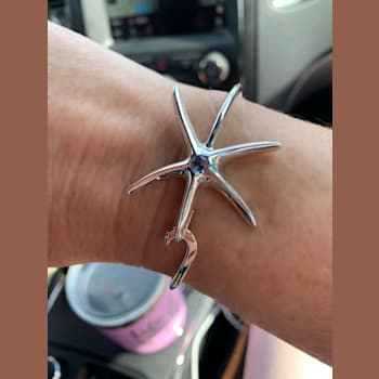 Sterling Silver Starfish Bangle Bracelet with Blue CZ Center.