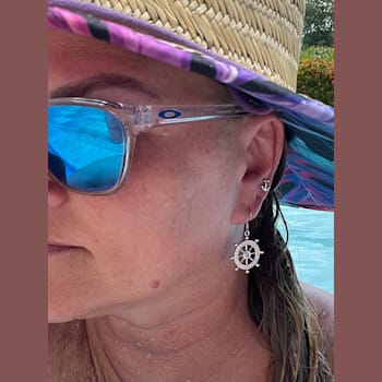 Sterling Silver Ship Wheel Dangle Earrings with White Crystal and Blue CZ.