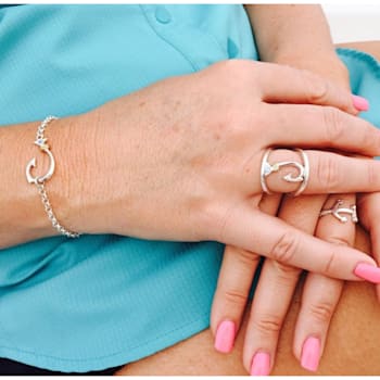 Sterling Silver Anchor Ring with Rope Design and Blue CZ Accent.