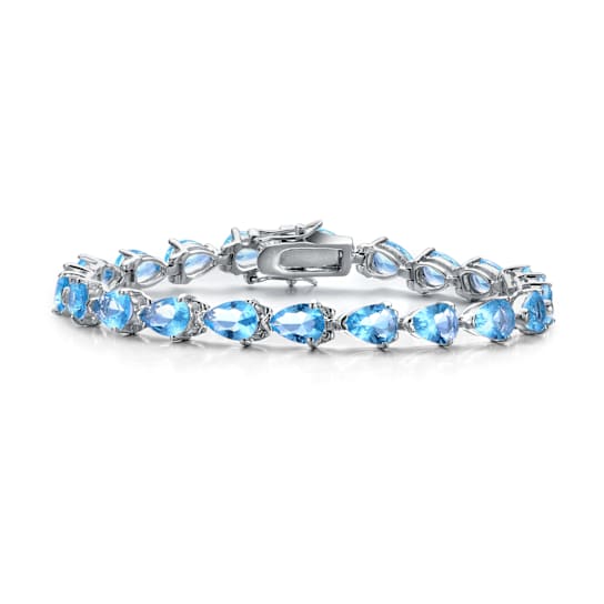 Blue Topaz Color CZ Pear Shape Tennis Bracelet In White Rhodium Over Brass