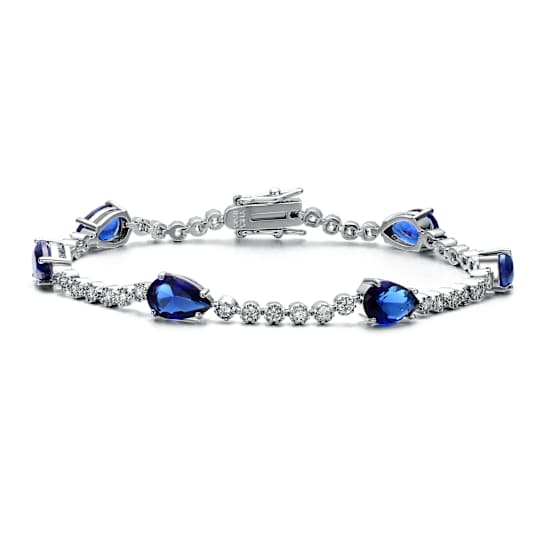 Sapphire Color CZ Pear Shape Tennis Bracelet In White Rhodium Over Brass