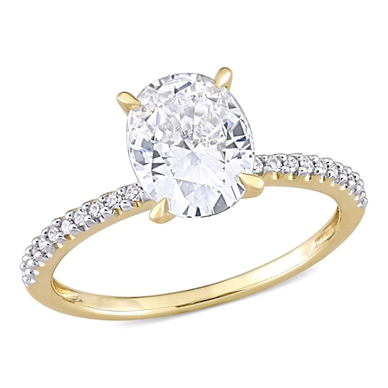 2 CT DEW Created Moissanite and 1/10 CT TW Diamond Engagement Ring in
14K Gold