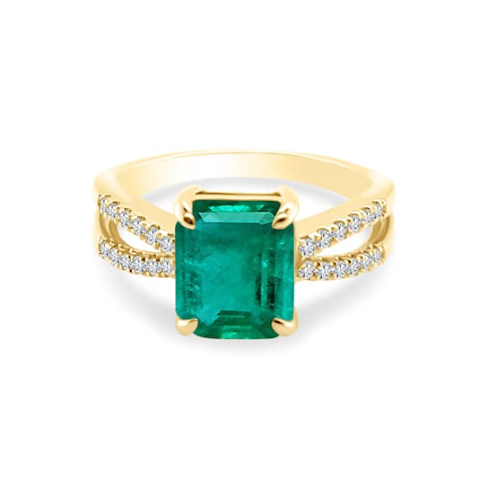 2.46Cts, Colombian Emerald, 0.20cw diamond crafted in 18K yellow gold ring.