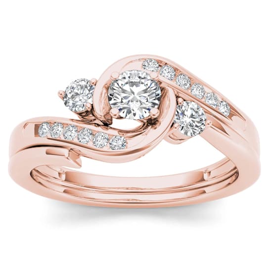10K Rose Gold .50ctw 3 Stone Diamond Engagement Ring and Wedding Band
(Color H-I, Clarity I2)