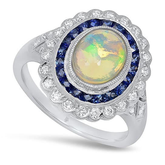 Beverley K 18K White Gold 0.35ctw Diamond and 0.76ctw Sapphire Ring set
with a 1.15ct Opal Center