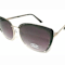 OSCAR by Oscar de la Renta Black and Gold Tone Cat Eye Frame / Smoke
Gradient Lenses Sunglasses