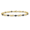 14k Yellow Gold and Rhodium Over 14k Yellow Gold Diamond and Oval
Sapphire Bracelet