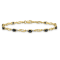 14k Yellow Gold and Rhodium Over 14k Yellow Gold Diamond and Oval
Sapphire Bracelet