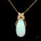 Ethiopian Opal Pear Shape Cabochon and Round Diamond 14K Yellow Gold
Pendant with Chain, 14.38ctw