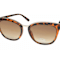 OSCAR by Oscar de la Renta Gold Tone and Brown Tortoise Frame/ Brown
Lenses Sunglasses