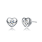 Heart CZ Stud Earrings In White Rhodium Over Brass