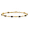 10k Yellow Gold and Rhodium Over 10k Yellow Gold Diamond and Oval
Sapphire Bracelet