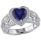 2 1/4 CT TGW Created Blue Sapphire and 1/10 CT TW Diamond Heart Ring in
Sterling Silver