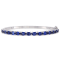 8-1/4 CT TGW Oval-Cut Created Blue Sapphire Bangle in Sterling Silver