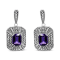 Sterling Silver Diamond Accent and 7x5mm Purple Amethyst Stud Earrings