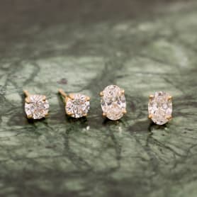 2 sets of diamond stud earrings