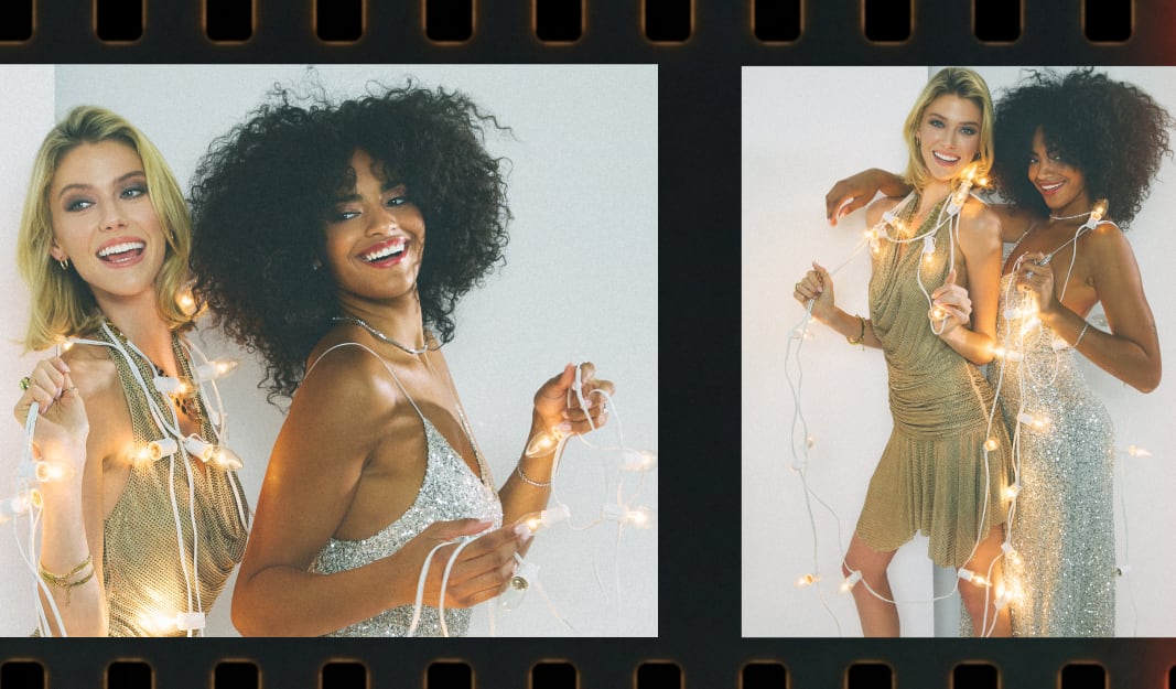 women with Christmas lights dressed up and wearing jewelry