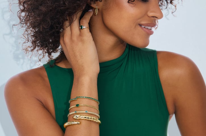 woman wearing a bracelet stack 