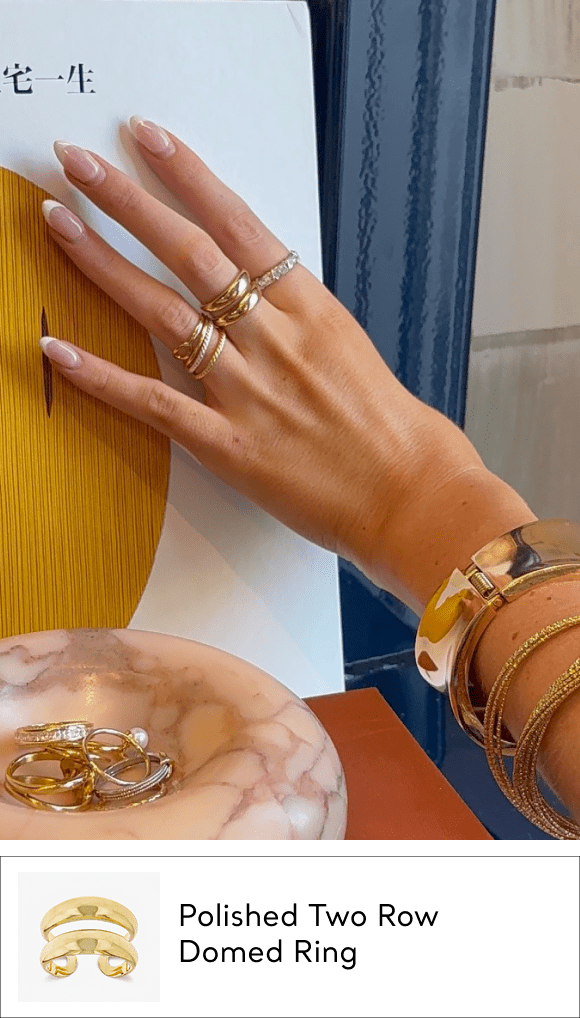 woman wearing gold double band ring