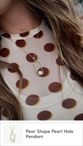 woman wearing gold pearl necklace