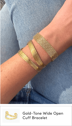woman wearing gold cuff bracelet