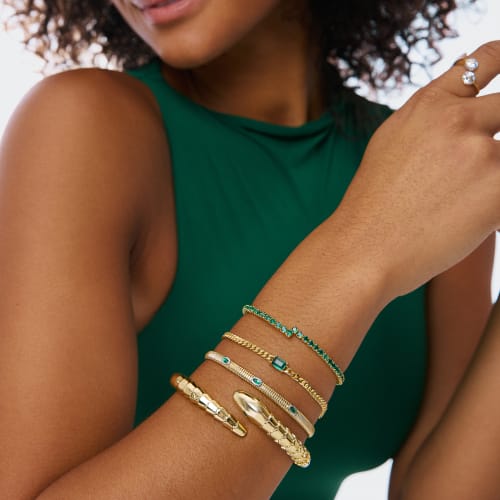 woman wearing bracelet stack