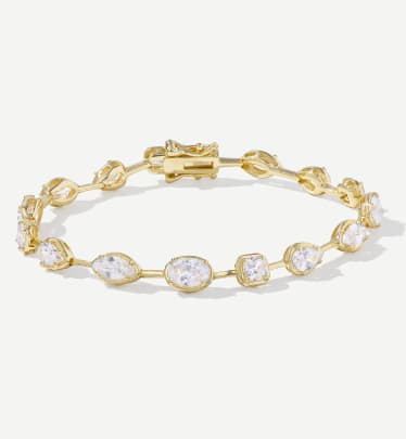 white stone and yellow gold tennis bracelet 