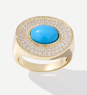 gold ring with turquoise and white stones 
