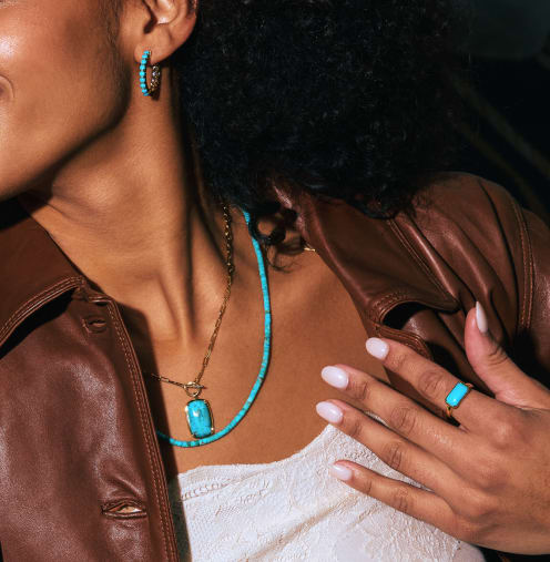 woman wearing turquoise jewelry