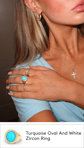 woman wearing gold turquoise ring