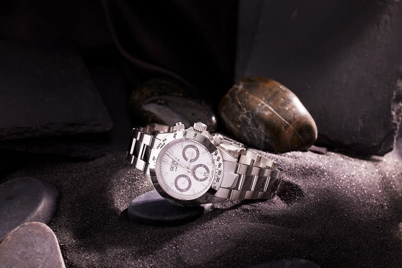 a gevril metal and chronograph watch 
