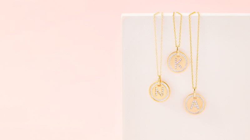 yellow gold circle pendants with initials 