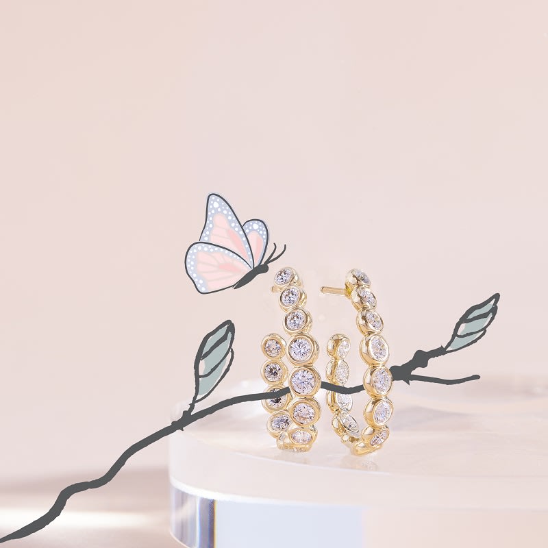 gumuchian white gemstone and gold earrings 