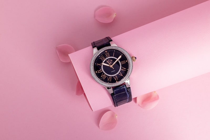 a mens' silver metal and blue leather watch 