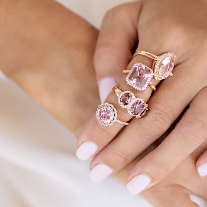 woman wearing lots of Bella Luce rings