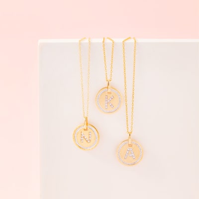 yellow gold circle pendants with initials 