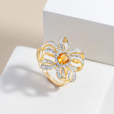 orange gemstone and diamond flower ring 