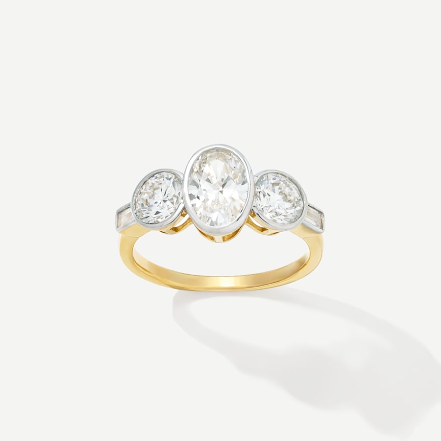 timeless lab-grown diamond oval solitaire ring with diamond halo in 14k gold 