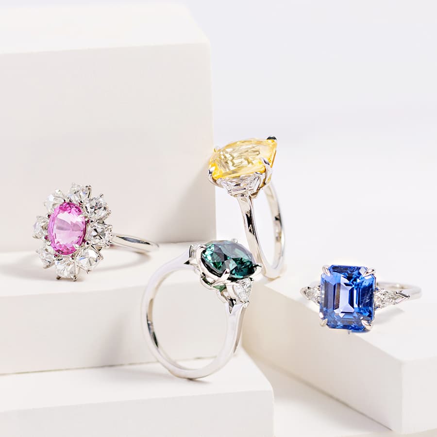Four different-colored sapphire rings 