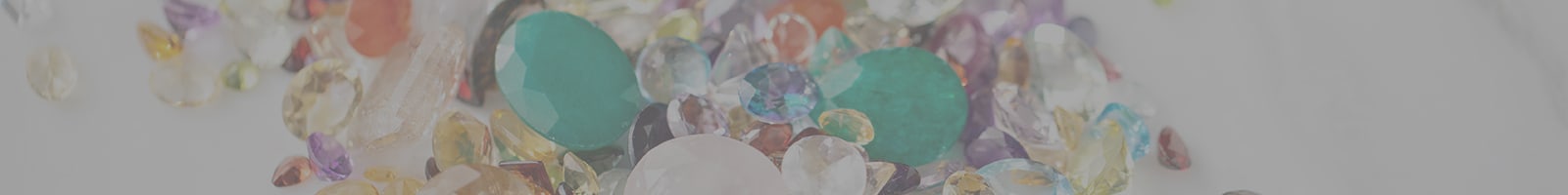 bunch of multi-color loose gemstones
