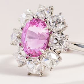 fashion ring pink center stone diamond side stones